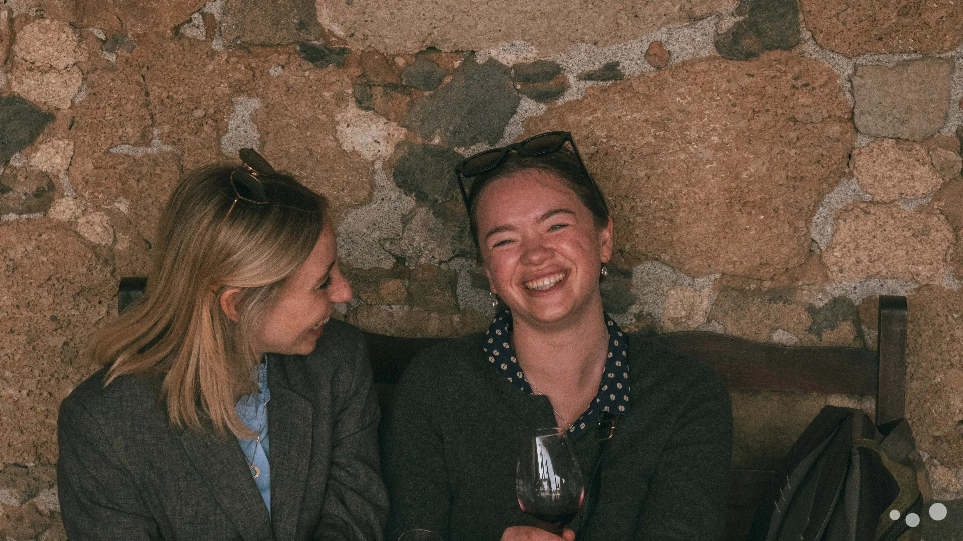 Certainly team members laughing together at a wine tasting in Tenerife