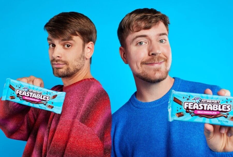 MrBeast and team holding Feastables chocolate bars